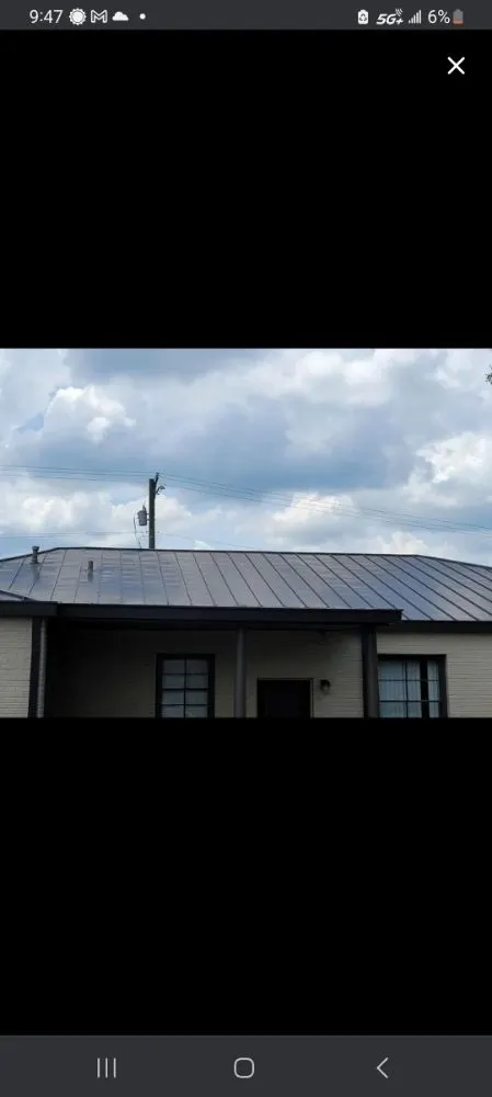 Slide of The Roofing Guys