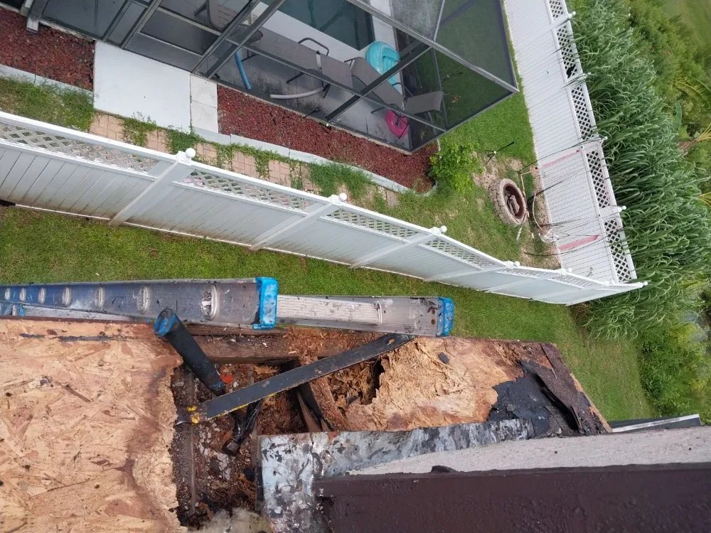 Slide of The Roofing Guys