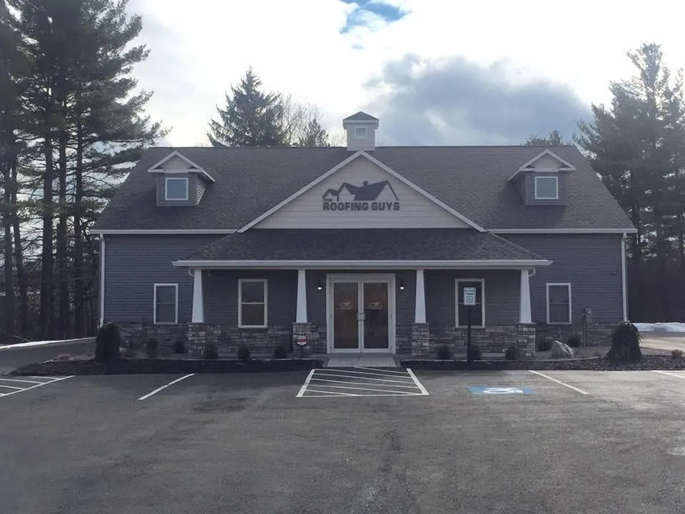 Slide of The Roofing Guys