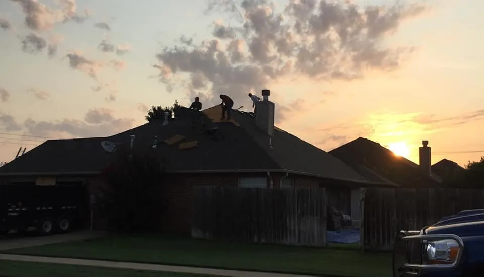 Slide of The Roofing Guys