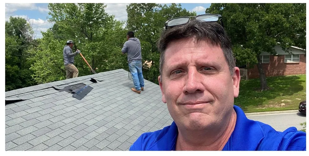 Slide of The Roofing Guys