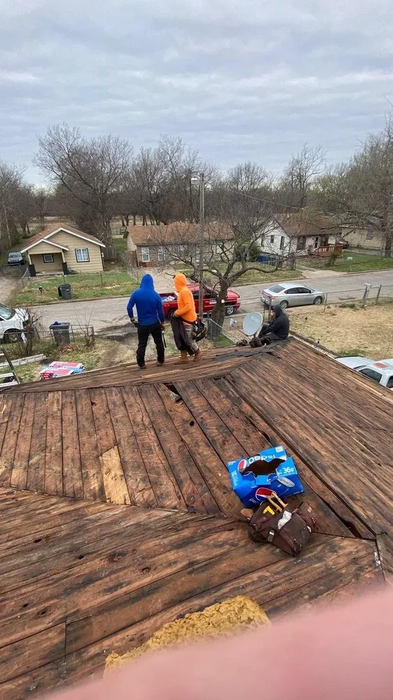 Slide of The Roofing Guys