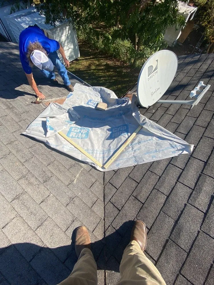 Slide of The Roofing Guys