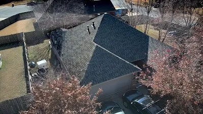 Slide of The Roofing Guys