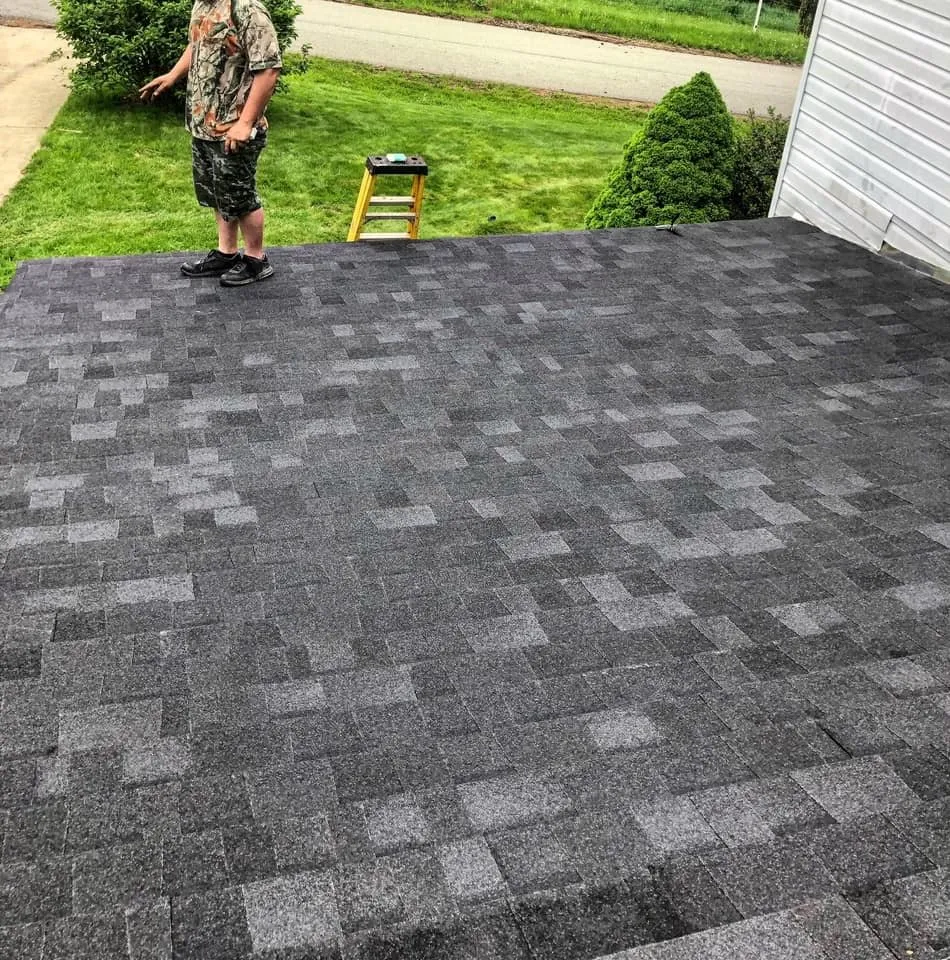 Slide of The Roofing Masters