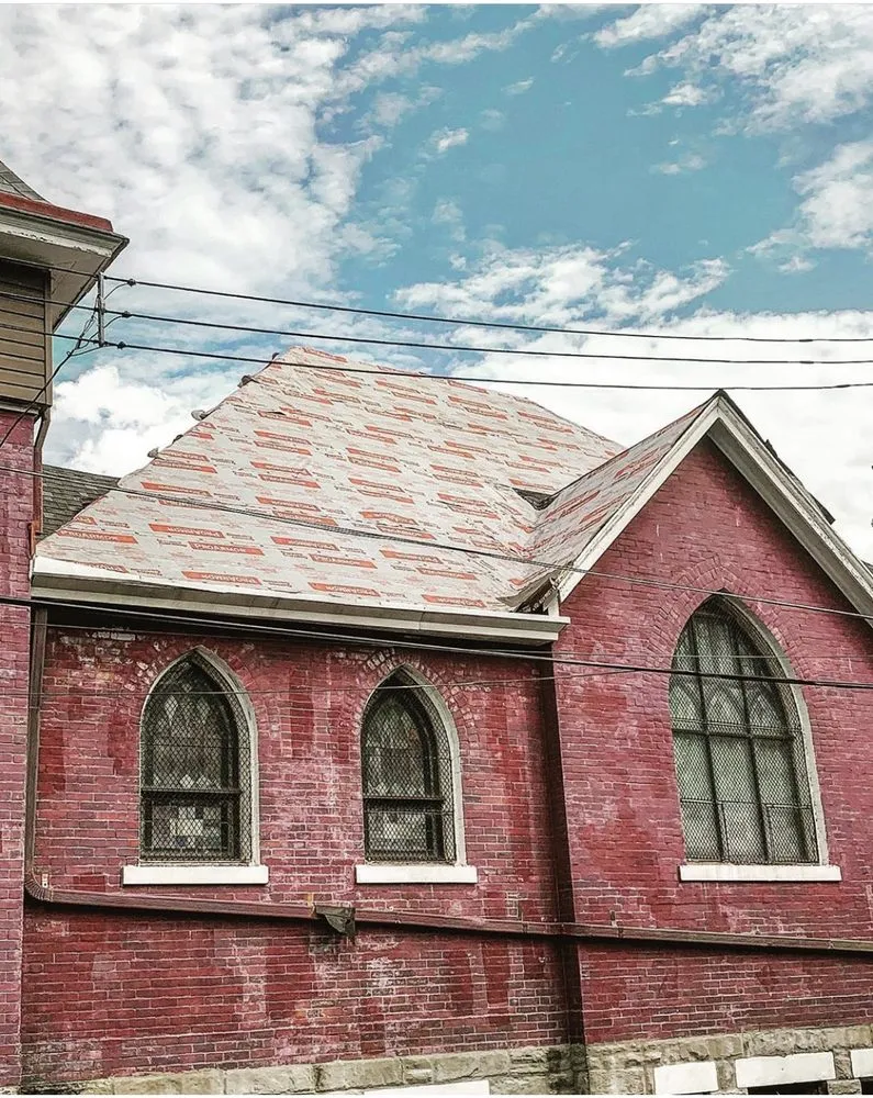 Slide of The Roofing Masters