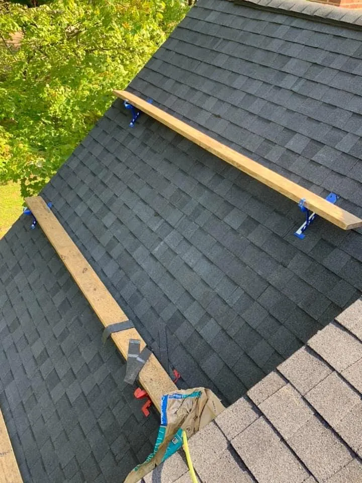 Slide of The Roofing Masters
