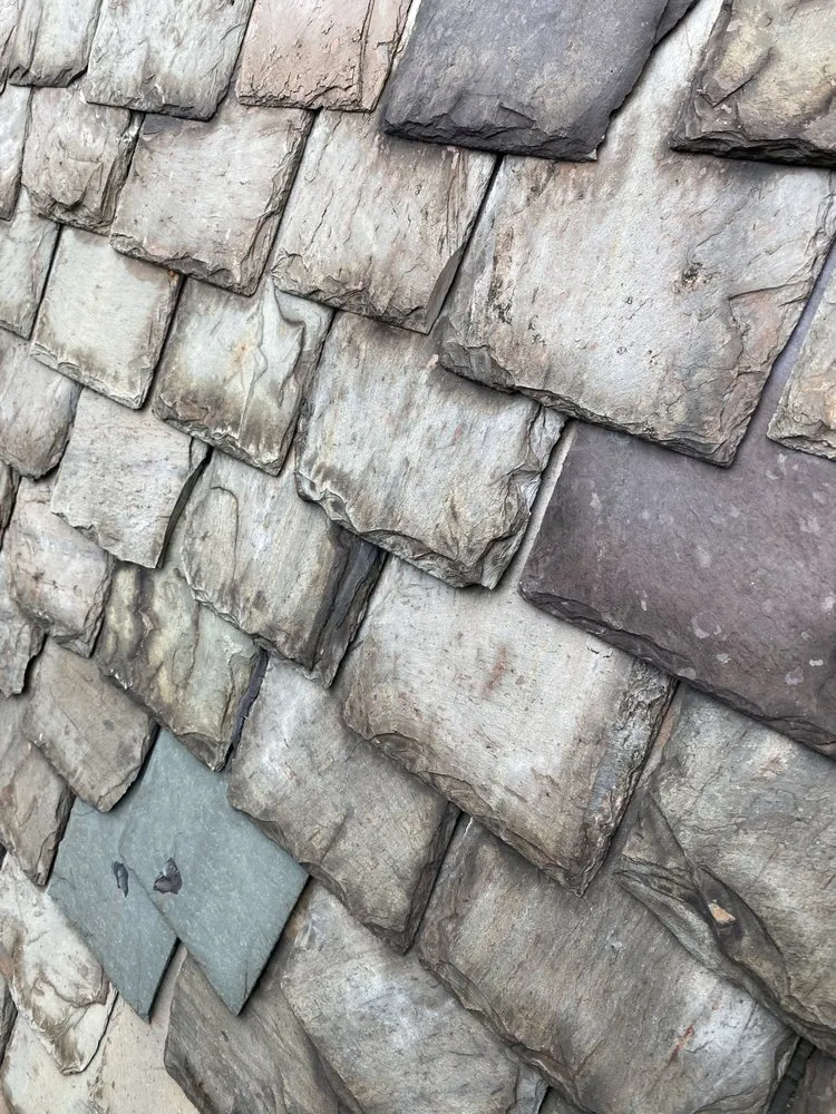 Slide of The Roofing Masters