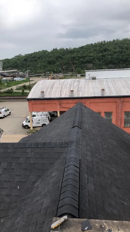 Slide of The Roofing Masters