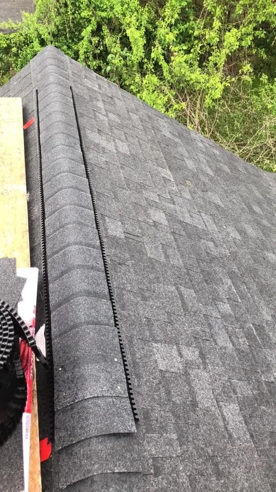 Slide of The Roofing Masters