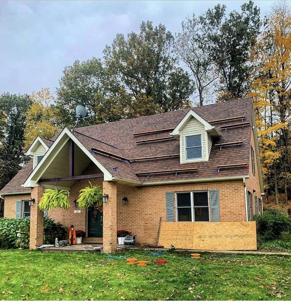 Slide of The Roofing Masters