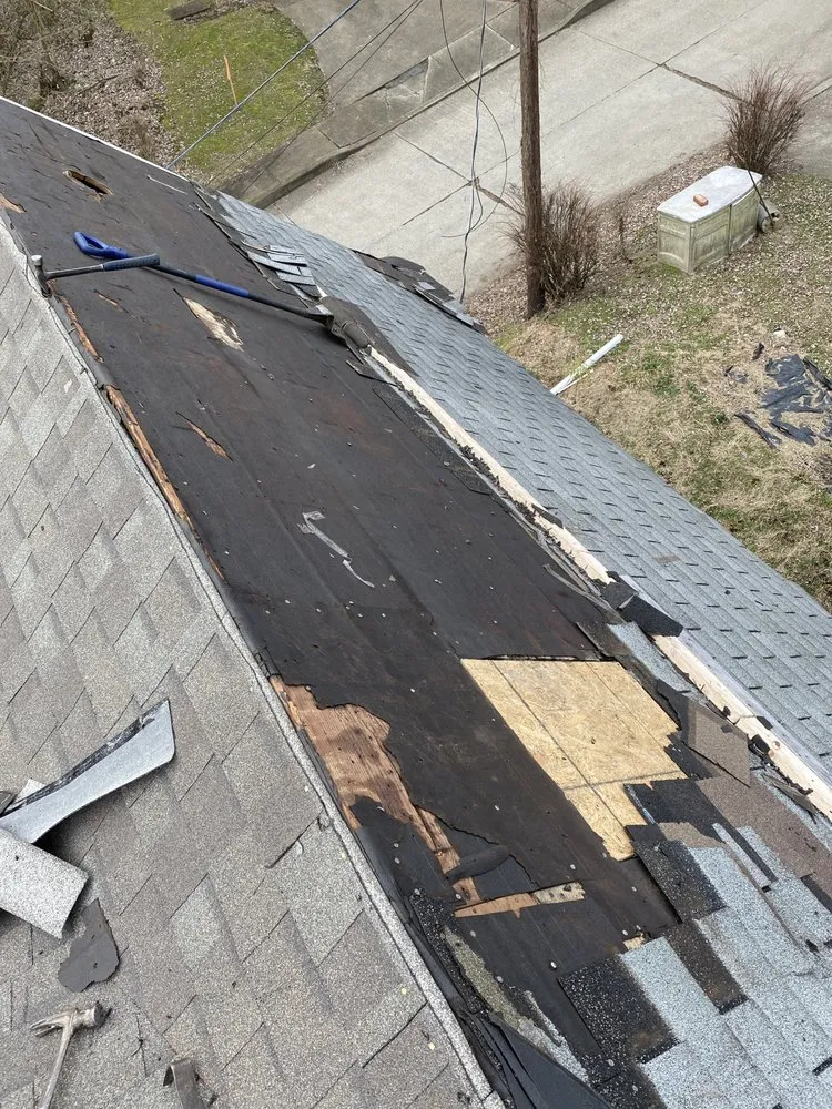 Slide of The Roofing Masters