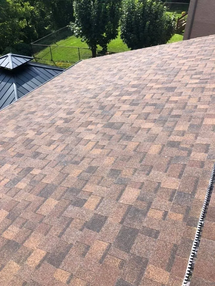 Slide of The Roofing Masters