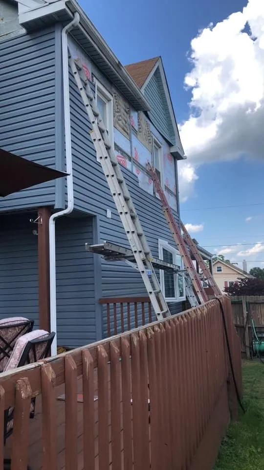 Slide of The Roofing Masters