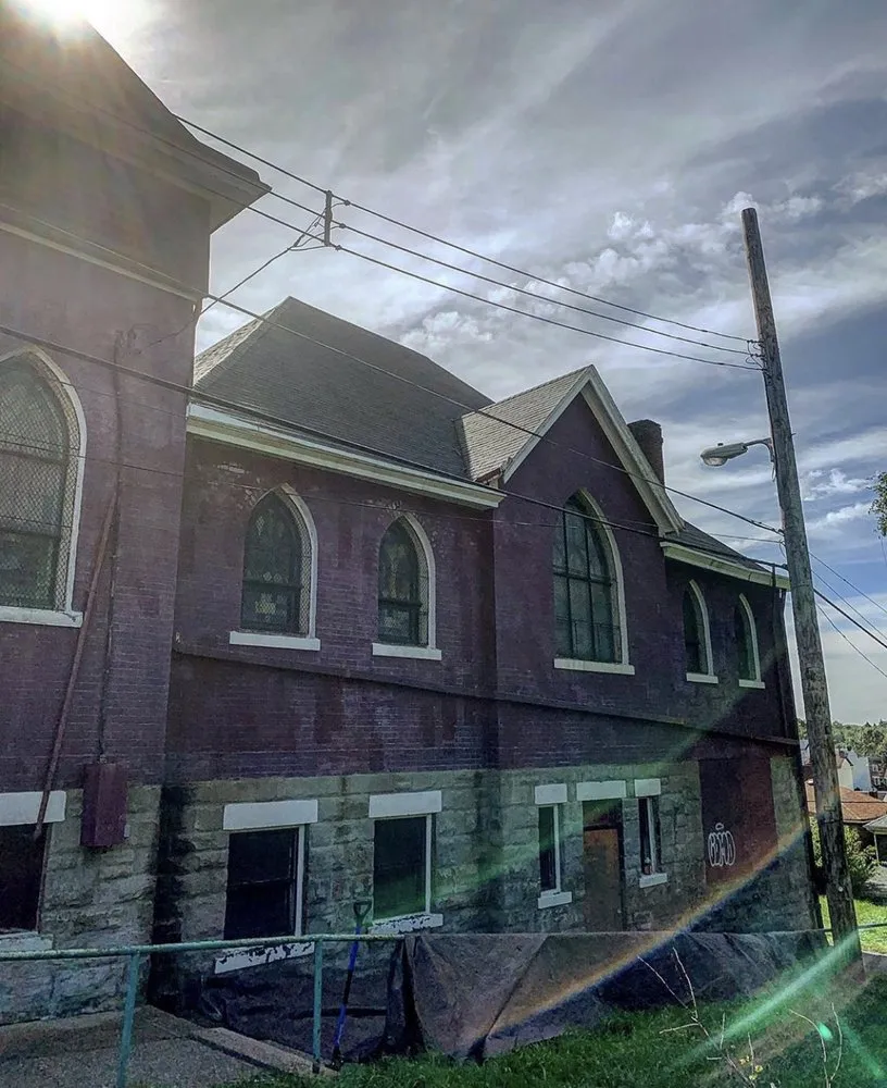 Slide of The Roofing Masters