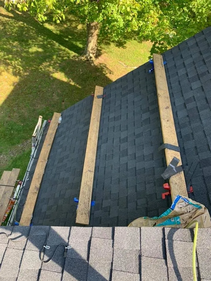 Slide of The Roofing Masters