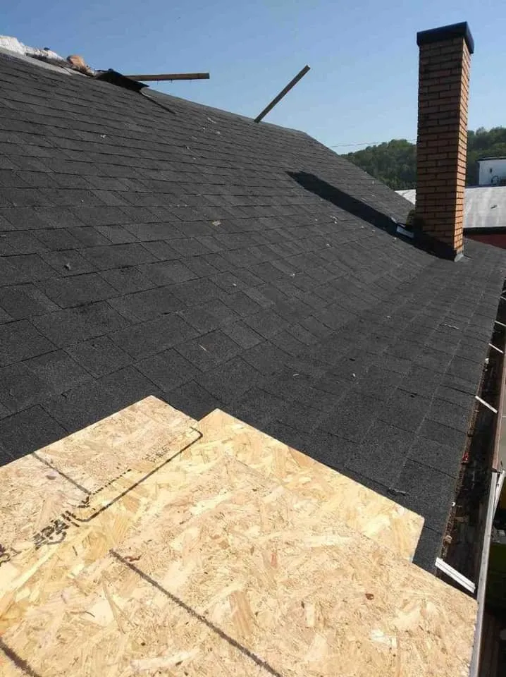 Slide of The Roofing Masters