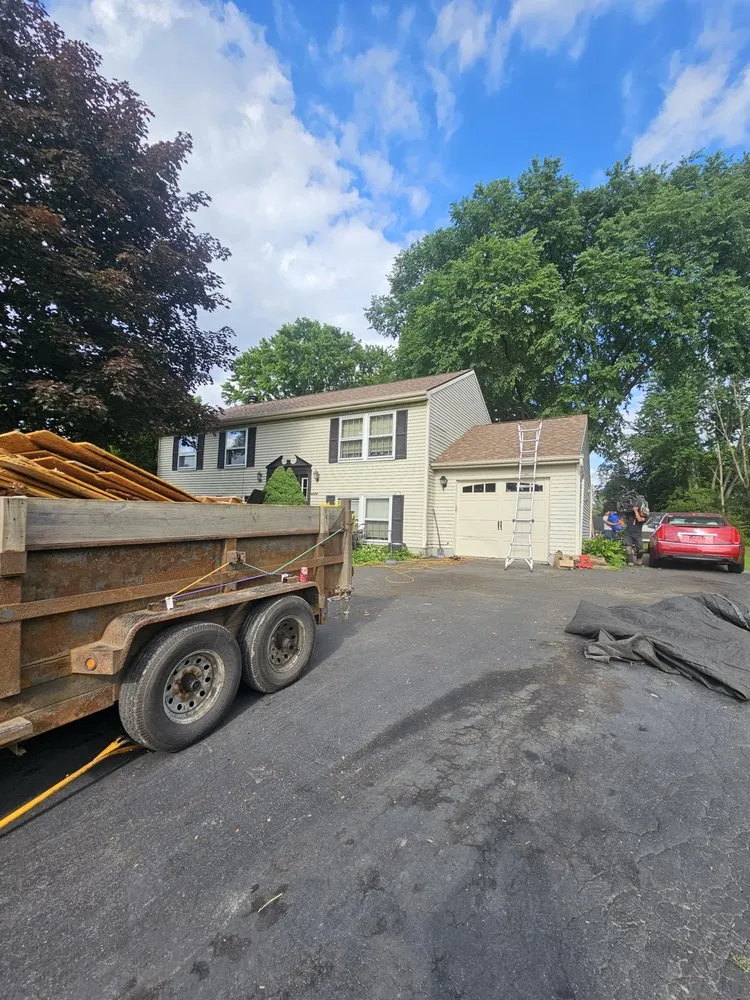 Slide of The Roofing Medic