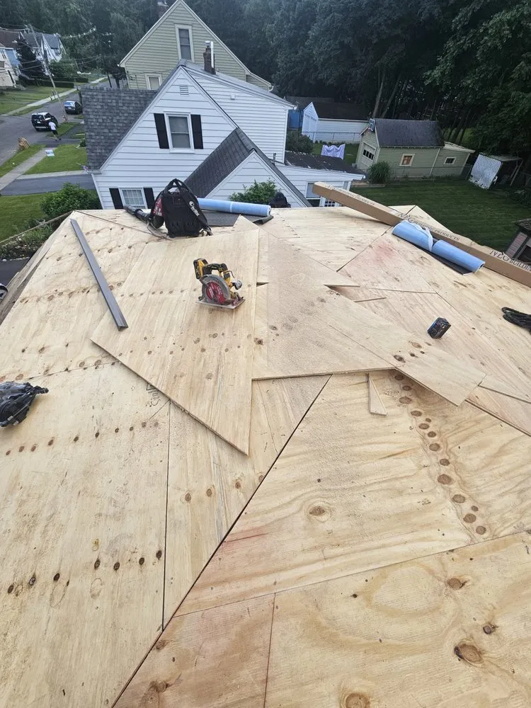 Slide of The Roofing Medic