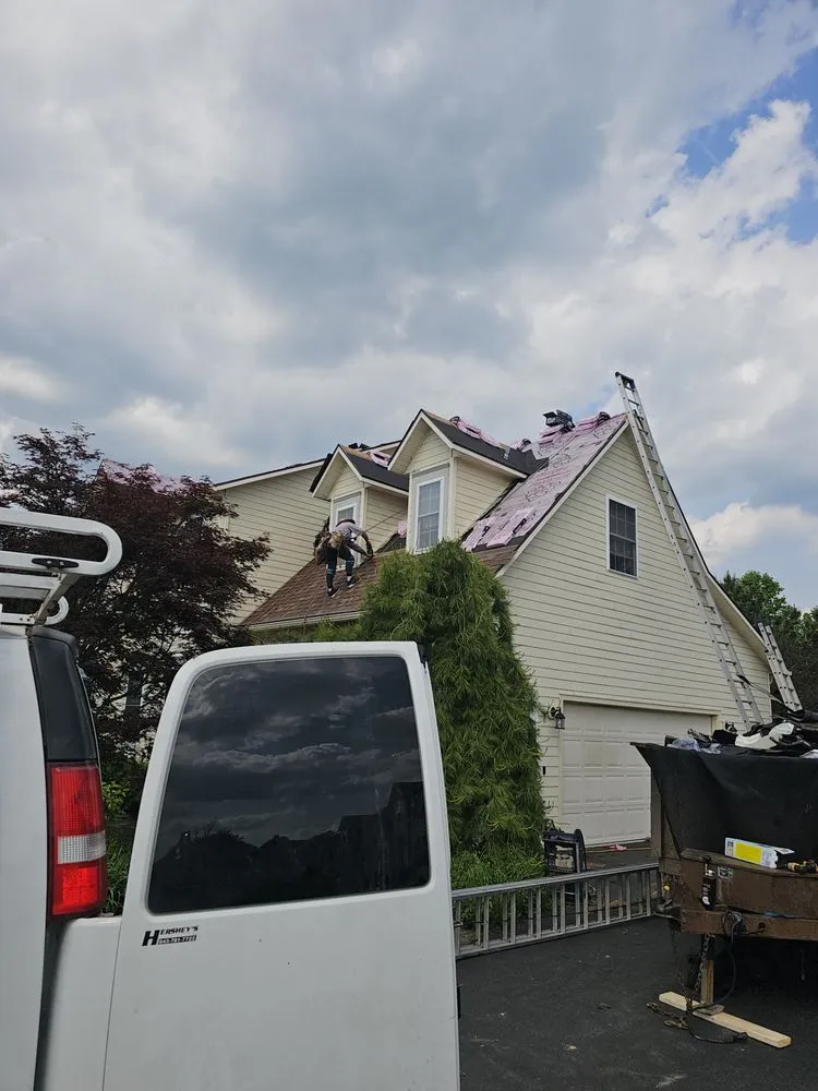 Slide of The Roofing Medic