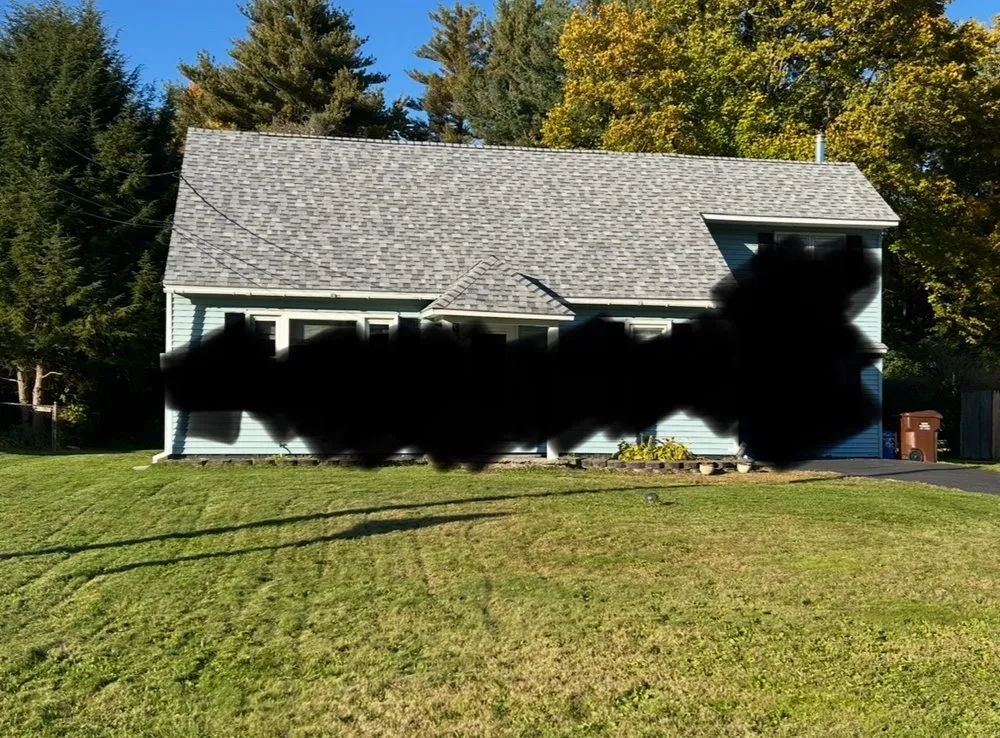 Slide of The Roofing Medic