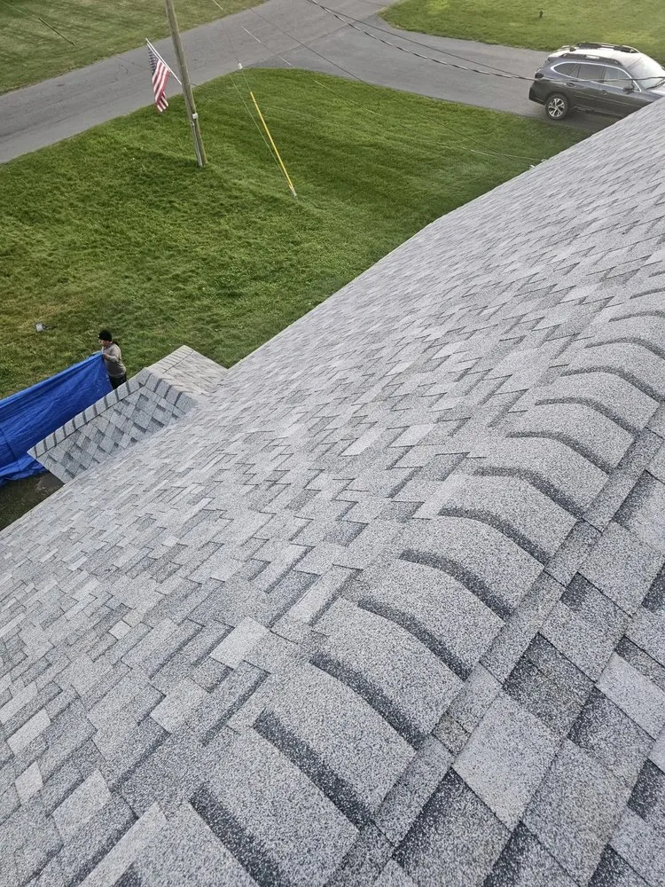 Slide of The Roofing Medic