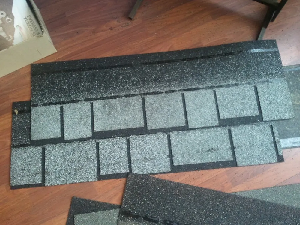 Slide of The Roofing Outlet