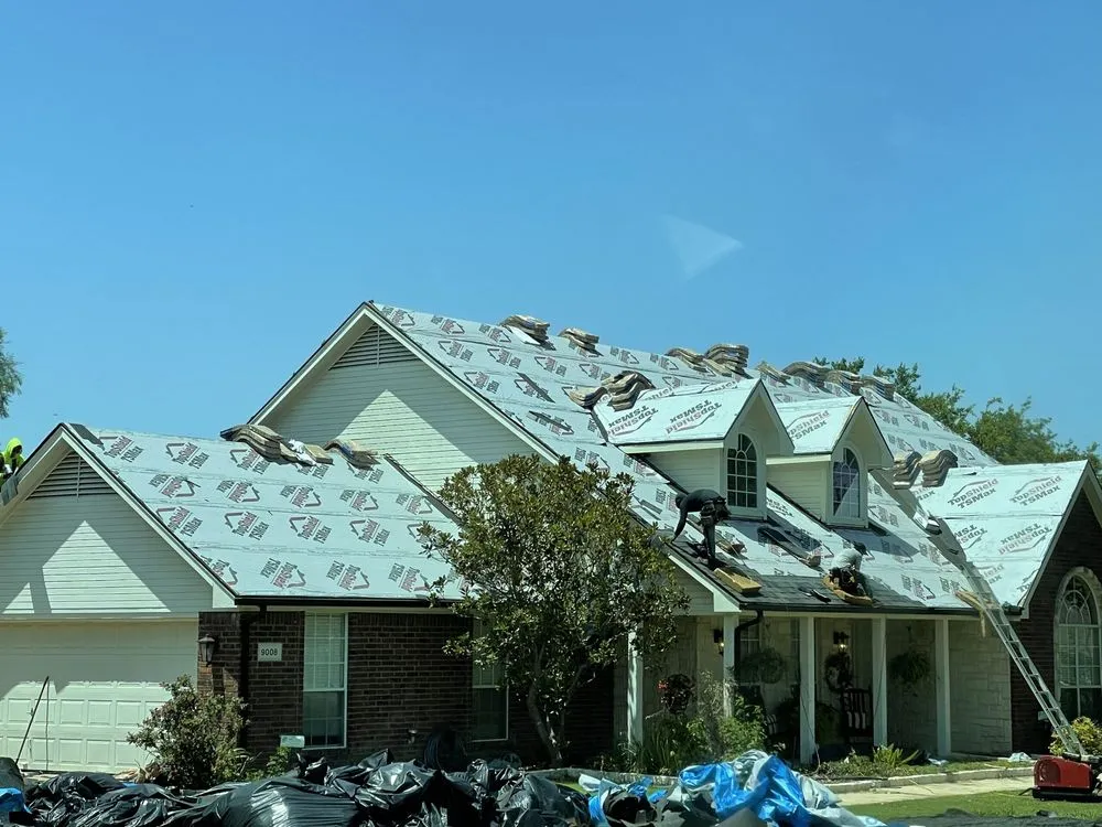 Slide of The Roofing Pro