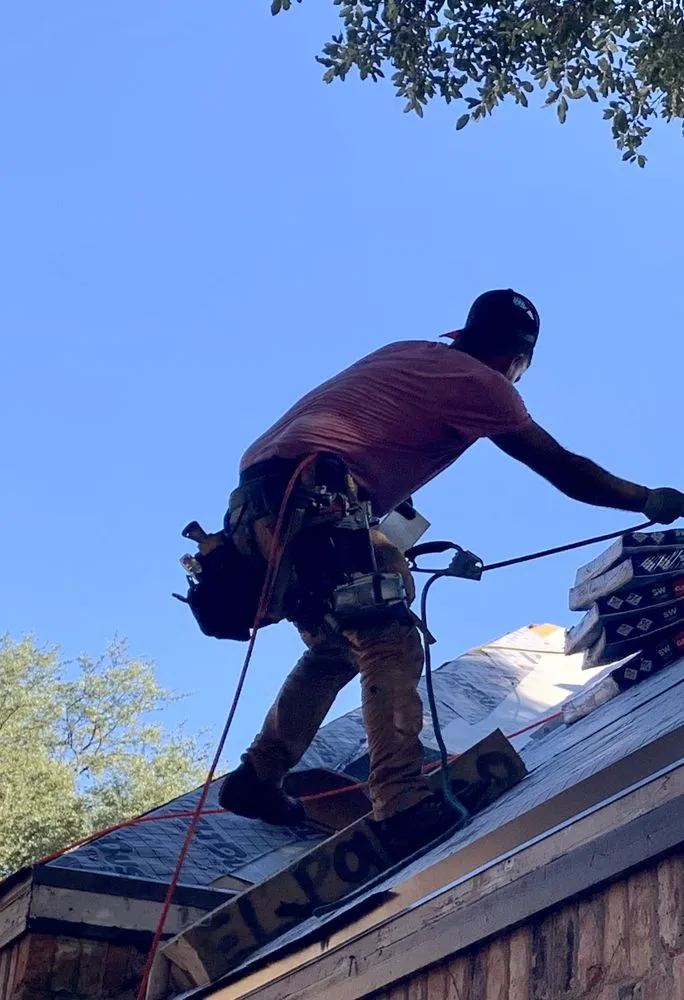 Slide of The Roofing Pro