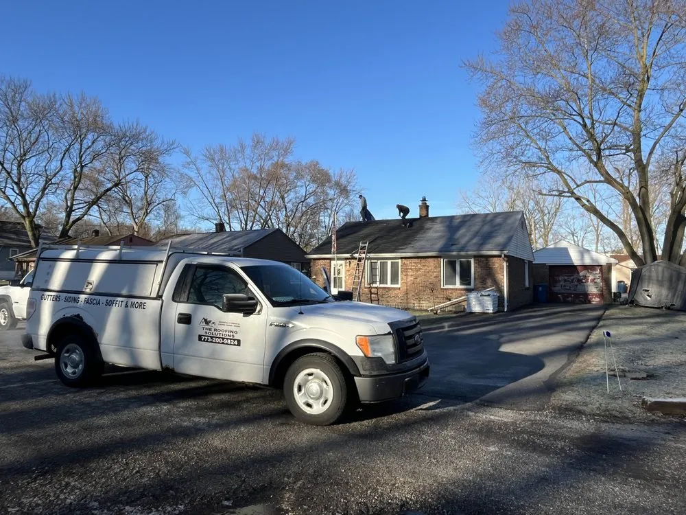 Slide of The Roofing Solutions