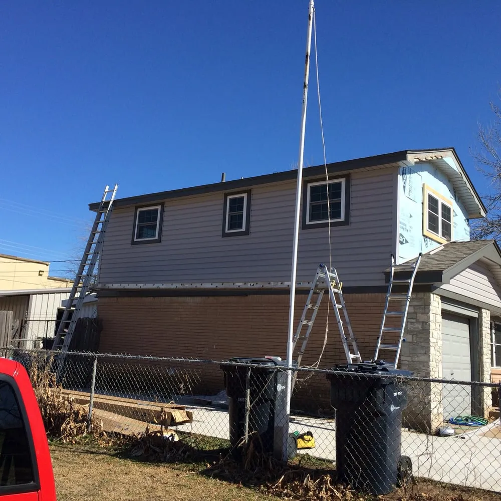 Slide of The Roofing Specialist