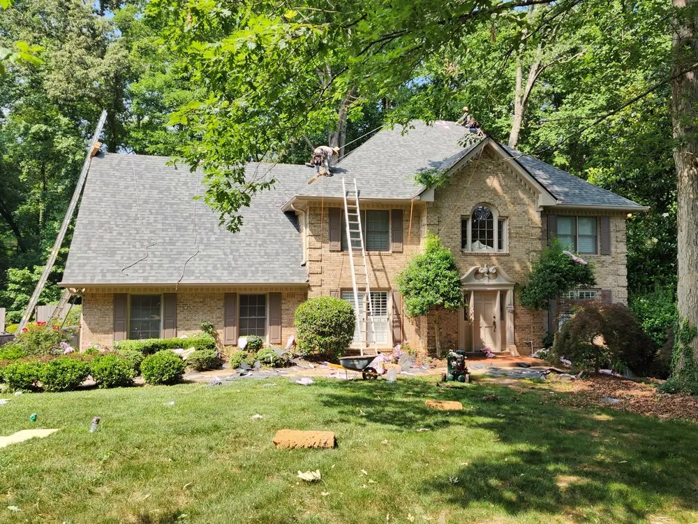 Slide of The Roofing Specialists