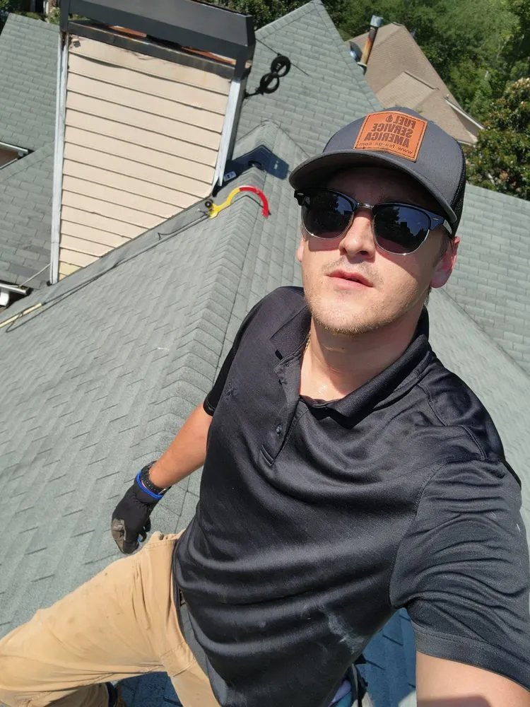 Slide of The Roofing Specialists