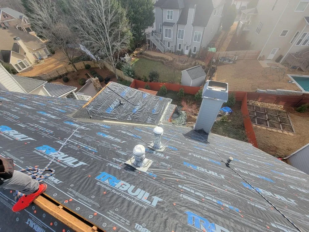 Slide of The Roofing Specialists