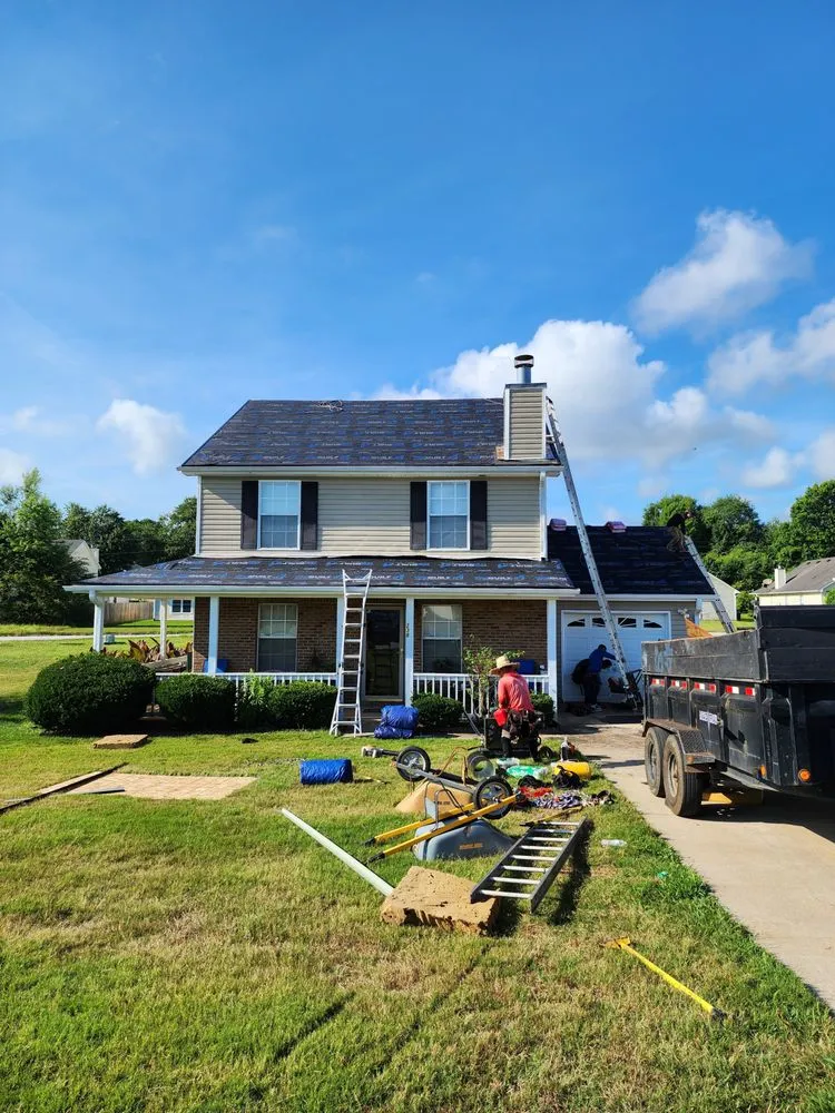 Slide of The Roofing Specialists