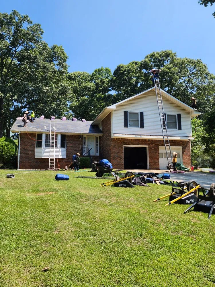 Slide of The Roofing Specialists