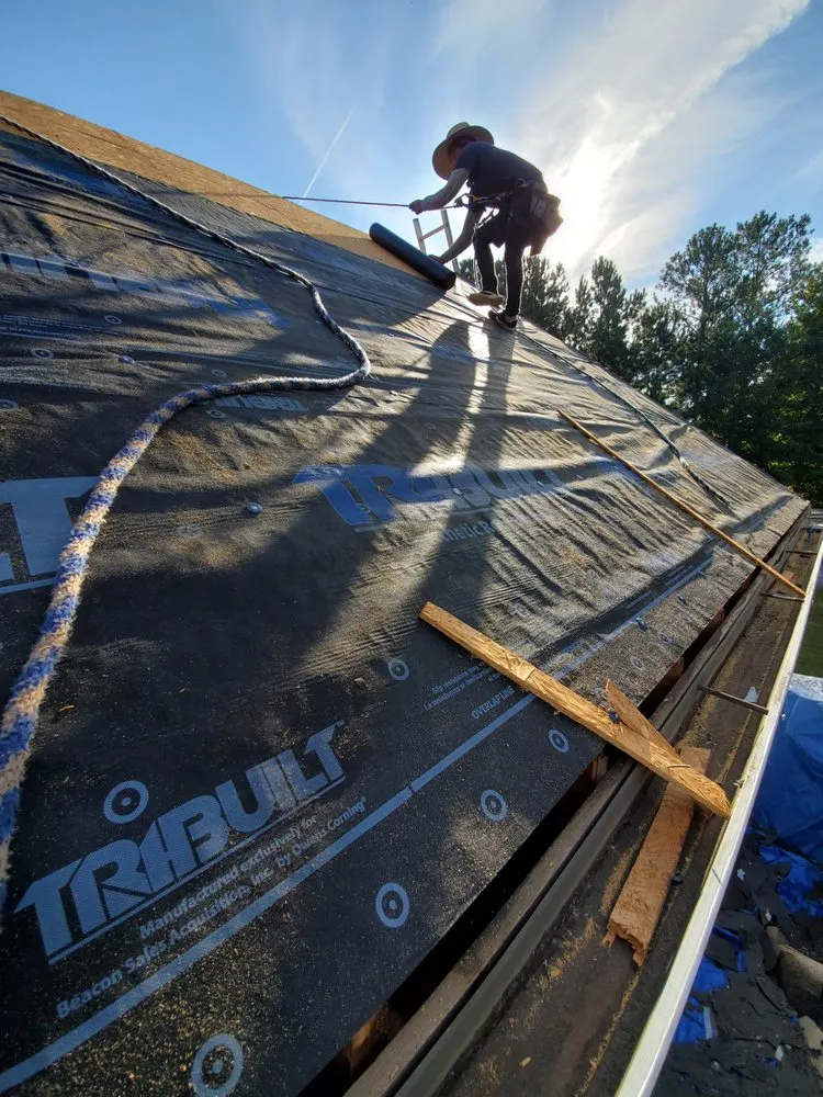 Slide of The Roofing Specialists