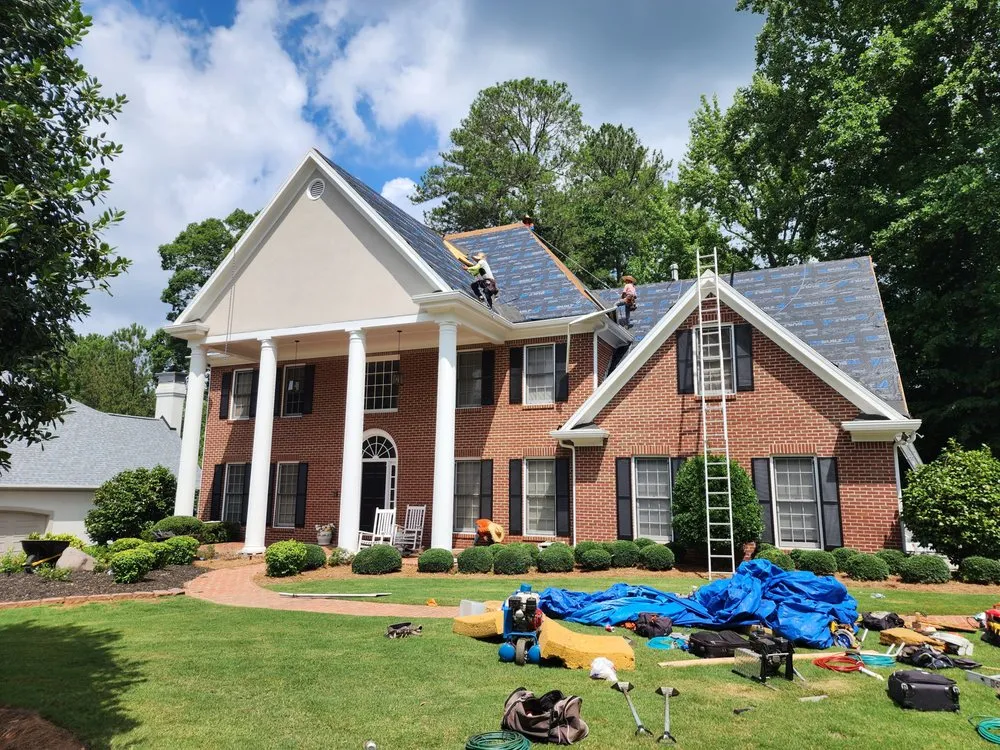 Slide of The Roofing Specialists