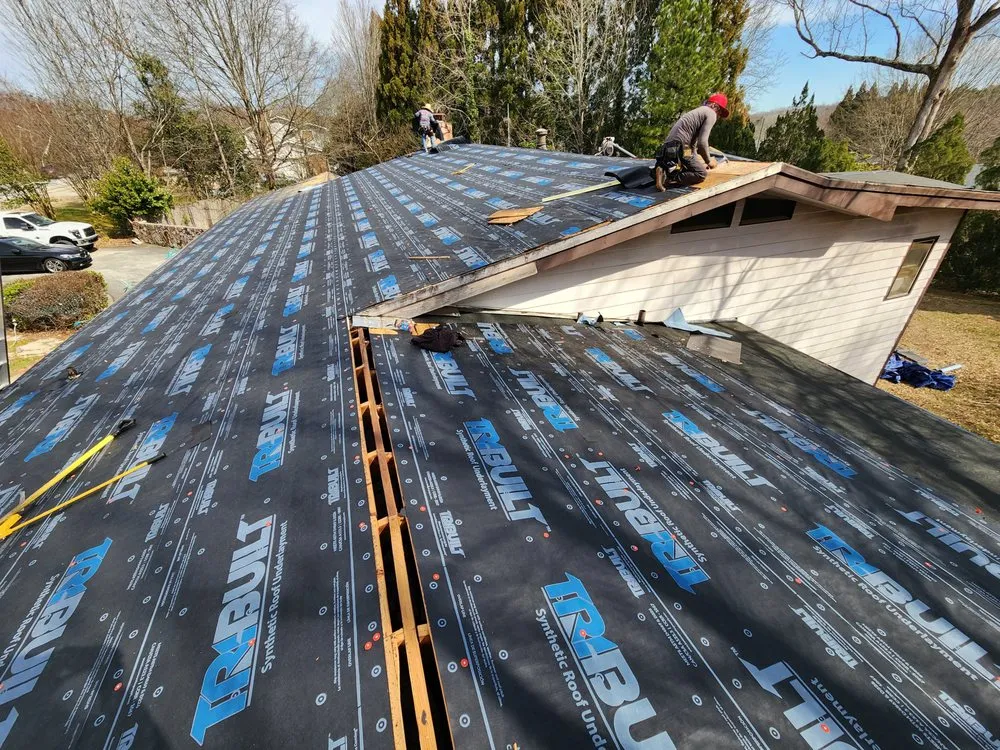 Slide of The Roofing Specialists