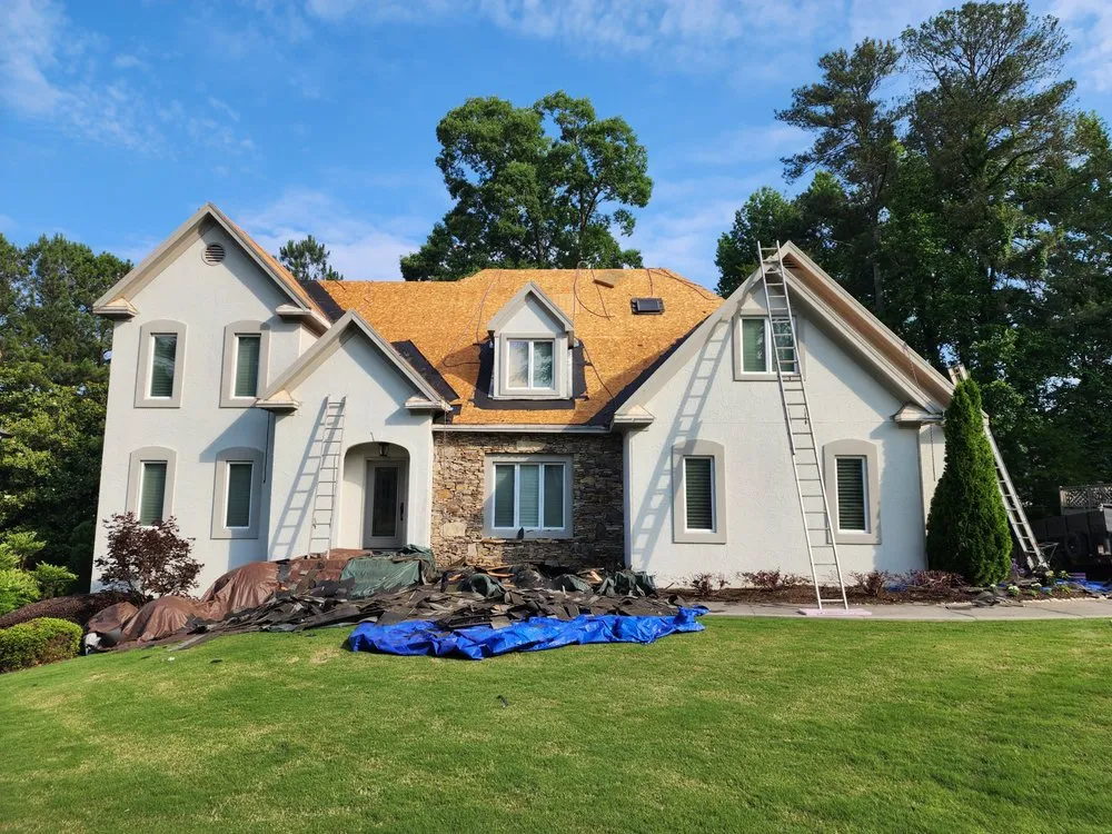 Slide of The Roofing Specialists