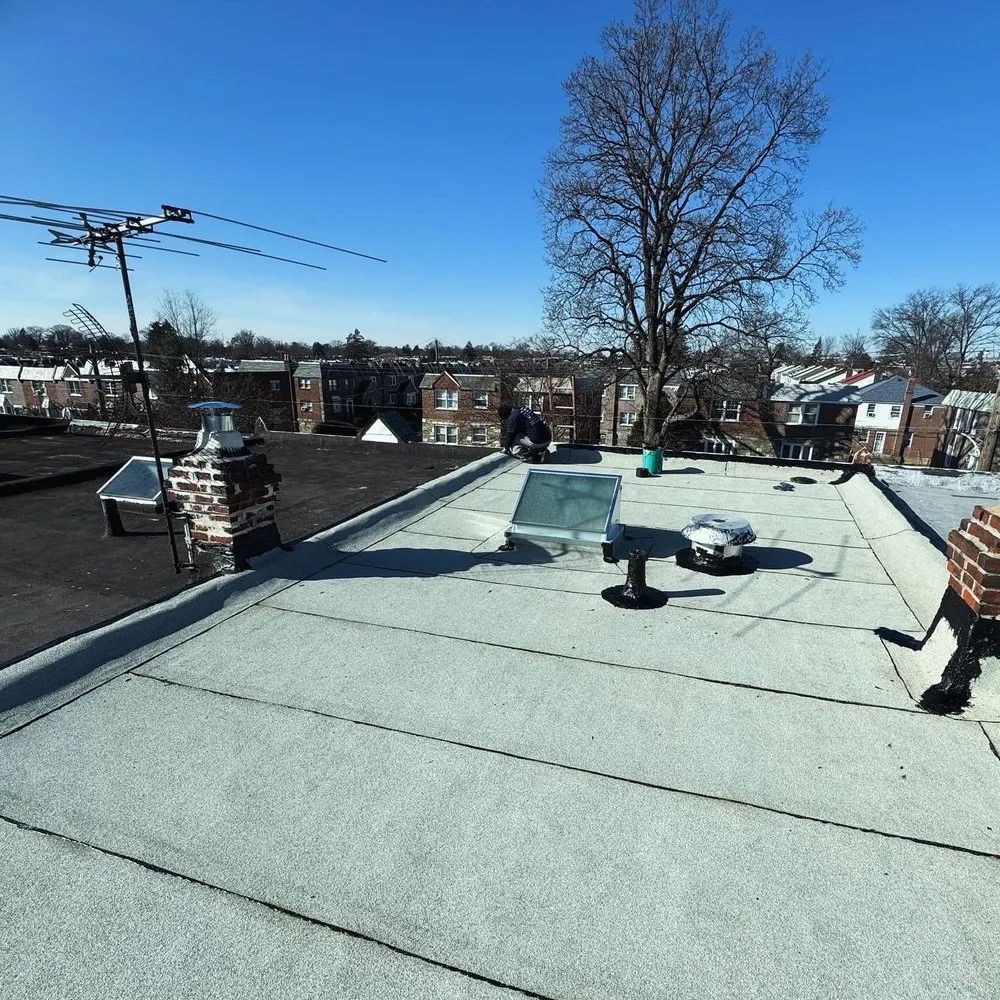 Slide of The Roofing Specialists