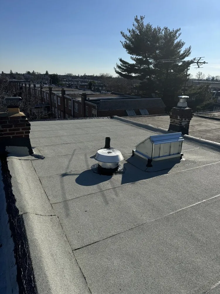 Slide of The Roofing Specialists