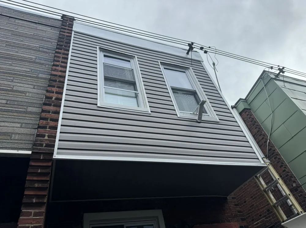 Slide of The Roofing Specialists