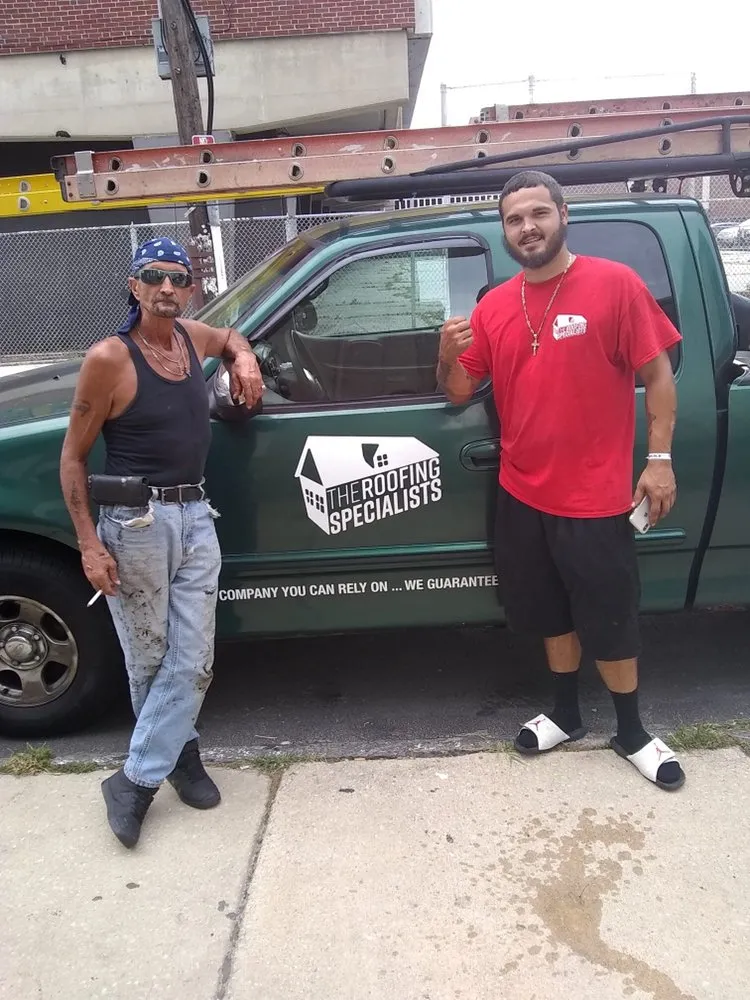 Slide of The Roofing Specialists