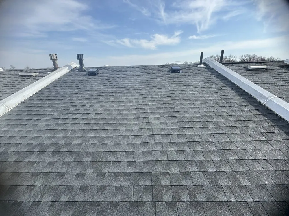 Slide of The Roofing Specialists