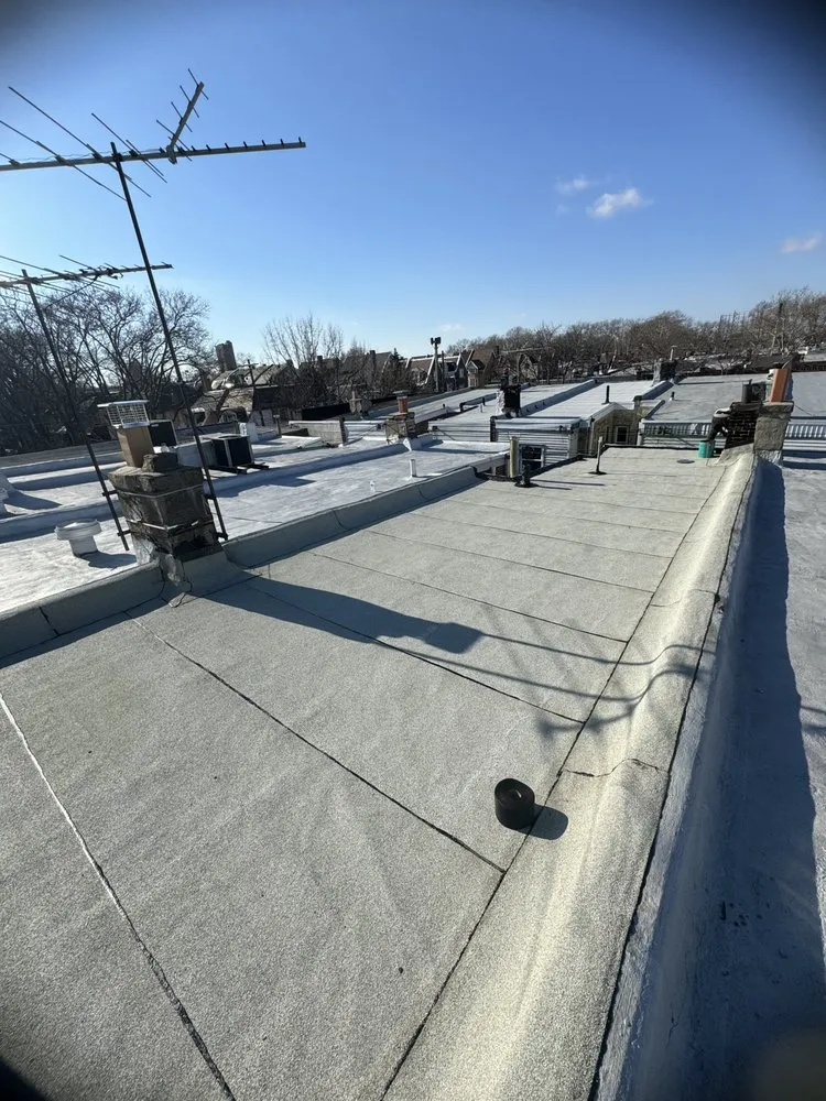 Slide of The Roofing Specialists