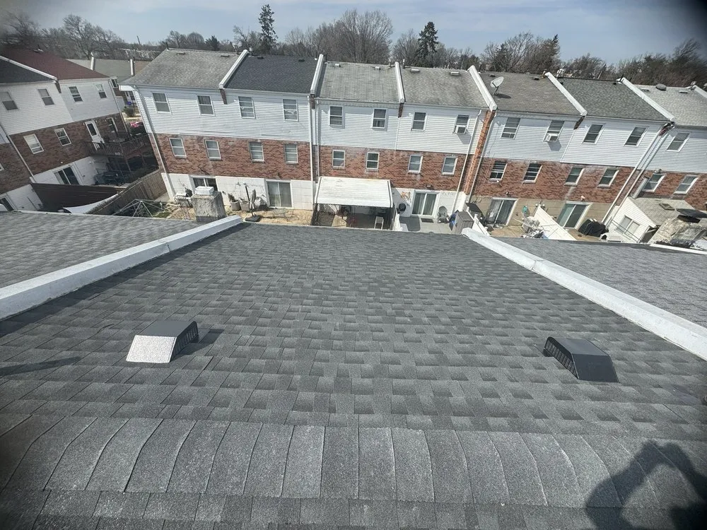 Slide of The Roofing Specialists