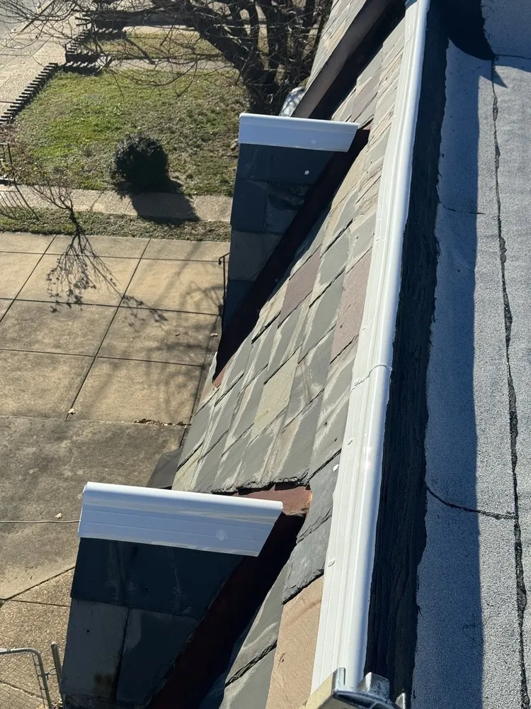 Slide of The Roofing Specialists