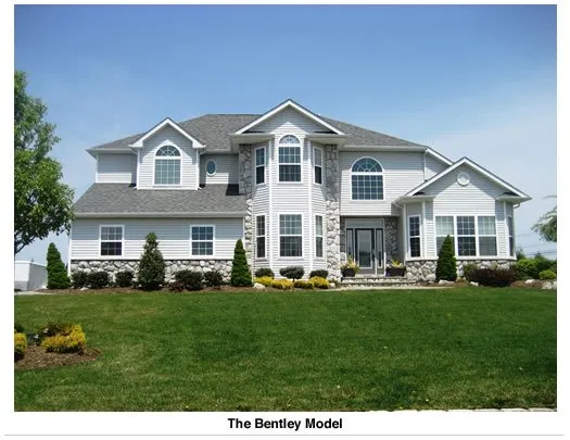 Slide of The Vinyl Siding Guys