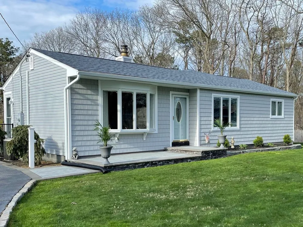 Slide of The Vinyl Siding Guys